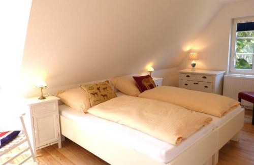 Norddorf House | Ferienhaus *Koggenhüs*