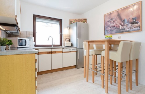 Malente Apartment | Ferienwohnung Hütt 3 mit Wintergarten im Haus Hüttmann in Bad Malente