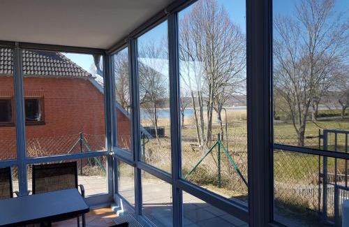 Neuensien Resort | Ferienwohnung Mönchgut 1 mit Wintergarten und Terrasse