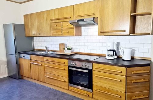 Langsur Apartment | Ferienwohnung mit Sonnenterrasse und Blick auf die Sauer