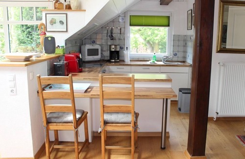 Butjadingen Apartment | Ferienwohnung Wintergarten - Ferienhaus "Am Deich 30"