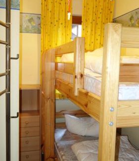 Neuensien Apartment | Fewo 7 im Fischerhaus Wintergarten und Terrasse mit Strandkorb