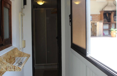 Marinha do Seixo Apartment | Fino Seixo, a spacious apartment with a large garden.