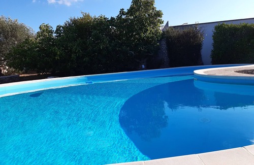 Cisternino Apartment | First floor apt. Shared, wonderful 9 metre terrace, pool and tennis court -