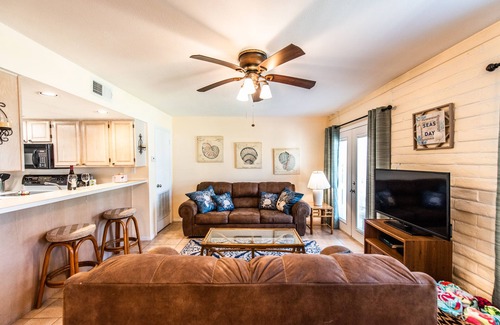 Port Aransas Villa | Flamingo House - First Floor Unit that’s a 5-7 minute walk to the beach.