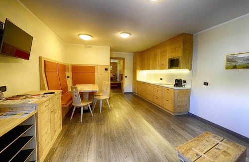 Teola Apartment | Flat Fopel - Baita Cusini with mountain views, wellness area and Wi-Fi