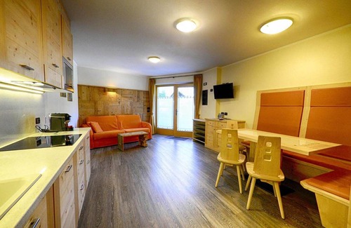 Teola Apartment | Flat Fopel - Baita Cusini with mountain views, wellness area and Wi-Fi