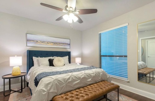 Austin Apartment | Flirty Flamingos l No Service Fees Poolside