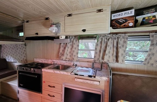 Hartford House | Foraging Orange vintage 60's camper near Rafting