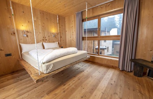 Senale San Felice Ski Chalet | Forest Chalet Resort FELIZITAS