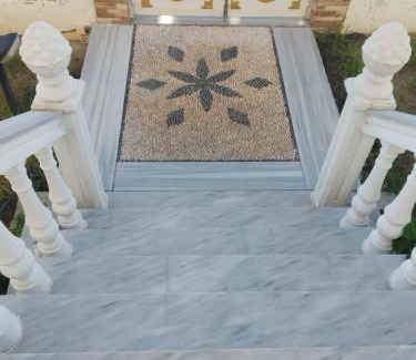 Petaloudes Villa | Freeman Greenlees Classical Greek