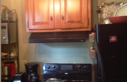 French Quarter Condo | French Quarter Early Creole Slave Quarter, Balcony, Courtyard.