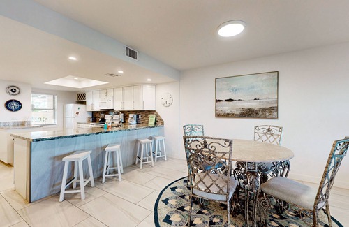 South Padre Island Condo | Fully Renovated Getaway with Beachfront Patio - Steps to Pool & Hot Tub