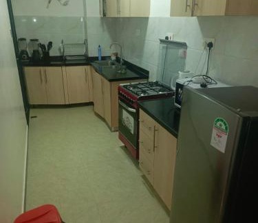 Western Province Apartment | furnished two bedroom apartment with swimming pool, fully equipped gym, private parking space ,children playground and unbeatable scenic city views in kilimani