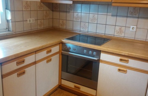 Lutzelbach Apartment | Gästehaus Lützelbach - Dachwohnung mit Esszimmer, Küche und Balkon