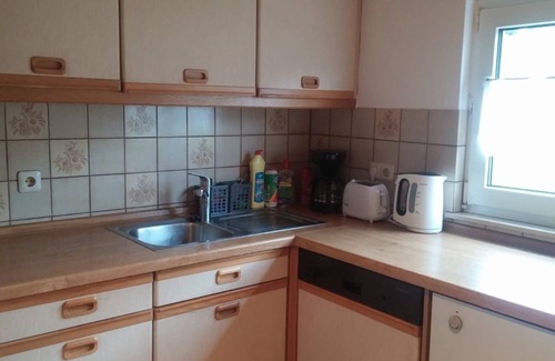 Lutzelbach Apartment | Gästehaus Lützelbach - Dachwohnung mit Esszimmer, Küche und Balkon