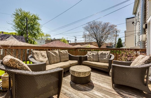 Logan Square Apartment | Garage Parking - Vintage Charm - and a Fabulous Location! Easily Enjoy the Best of Chicago! by AllSet Turnover