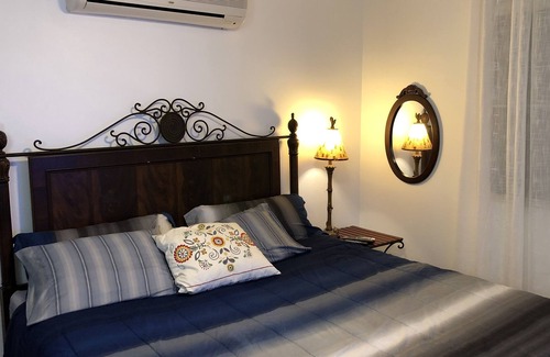 Miradero Condo | Garden apartment steps from the beach and pool, WiFi, Smart TV, screens.