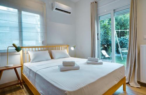 Papagou-Holargos Apartment | Garden Level Gem in the City