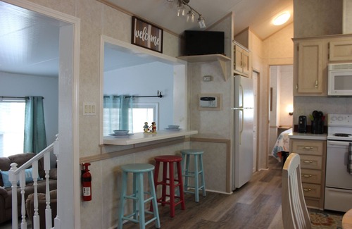 Upper Grand Lagoon Cottage | Gated resort offering relaxed, quite atmosphere. Minutes to beaches, restaurants