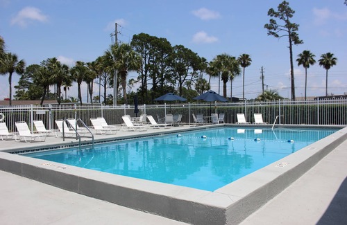 Upper Grand Lagoon Cottage | Gated resort offering relaxed, quite atmosphere. Minutes to beaches, restaurants