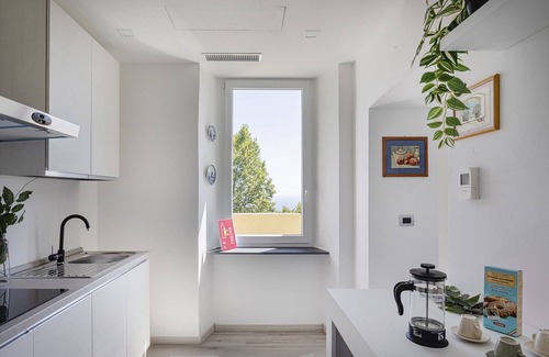 Castelletto Apartment | Genova Skyline with Terrace by Wonderful Italy