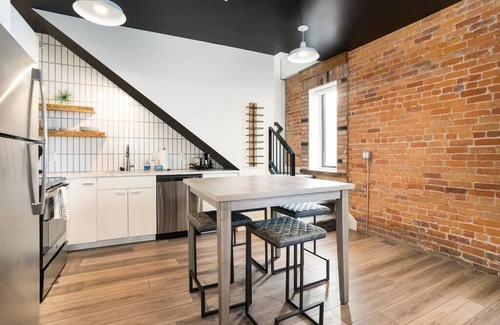 Holland Condo | George 202: Modern 8th Street Condo with City-View Balcony