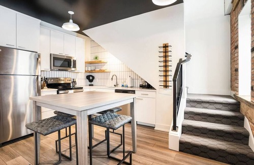 Holland Condo | George 202: Modern 8th Street Condo with City-View Balcony