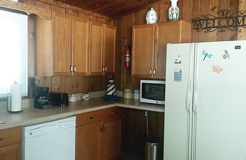 Port Austin Cottage | Get away from it all and relax with a view of Lake Huron in Downtown Port Austin