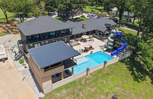 Grove House | Giant 10-bedroom lakefront home with large pool, hot tub, and dock