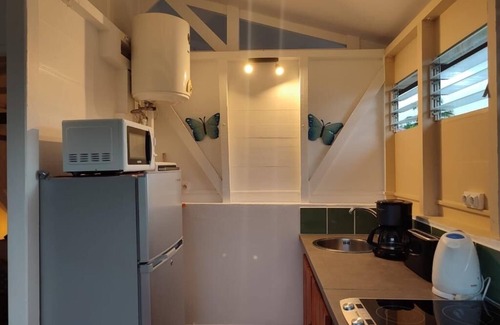 Bouillante Ski Chalet | Gîte Ti papiyon with swimming pool 5 minutes from Malendure beach