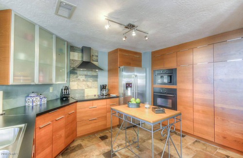 Red Mountain Ranch House | Golf course view retreat in Mesa.