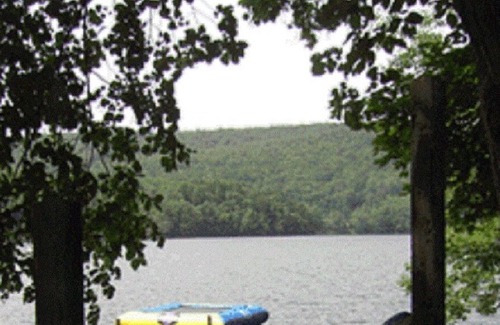 Maryland House | Goodyear Lake - docks and lake toys-kayaks, paddleboat water trampoline