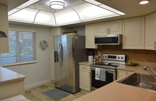 Whitney Beach Condo | Gorgeous canal front condo, fully equipped and just minutes from the beach.