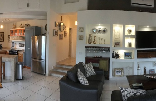 Cerro de Los Venados House | Gorgeous house in a neighbourhood surrounded by palm trees.