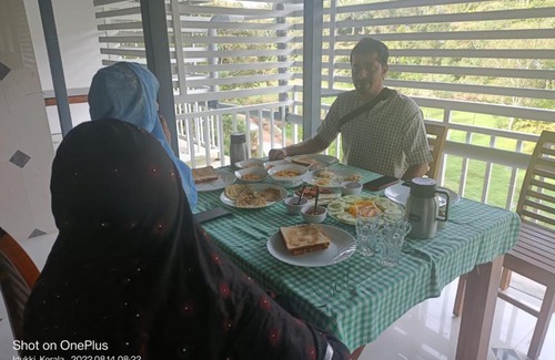 Kunchithanny House | Grace Munnar Resort