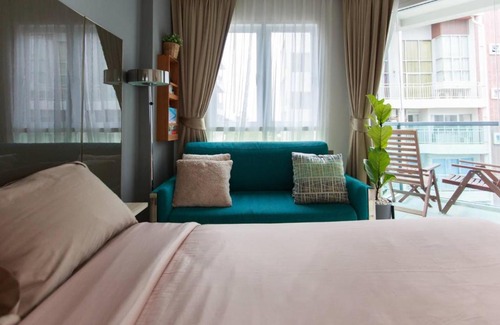 Kram Apartment | Grand blue condominium by Lookkaew