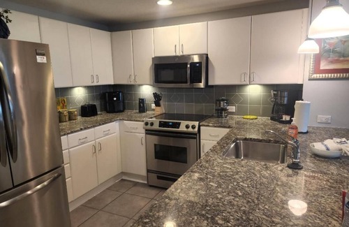 Panama City Beach Hotel | GRAND PANAMA 1st-Floor walk-out! Small Pet Friendly. Heated pools! Free WIFI !