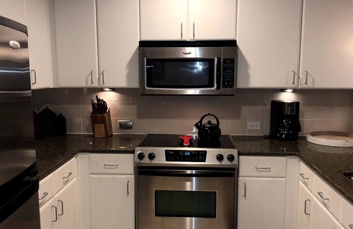 Panama City Beach Hotel | GRAND PANAMA 1st-Floor walk-out! Small Pet Friendly. Heated pools! Free WIFI !