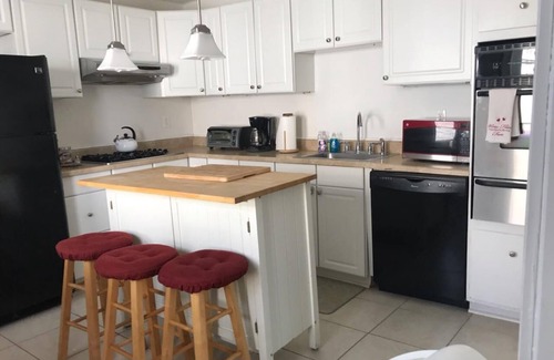 Devon House | Great Duplex with Water Views and Steps to the Beach