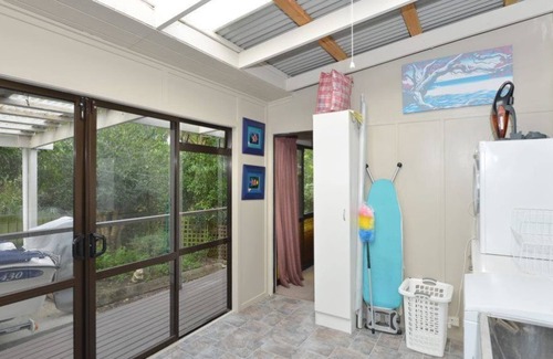 Whangarei Heads House | Great family holiday. Watersport, walks, surfing, tennis, golf, & cafes nearby!