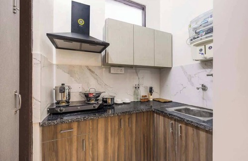 Sector 40 Apartment | Green stays, brighter days.