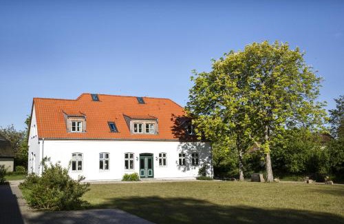 Pommerby House | Großzügiges Landhaus in Ostseenähe mit großem Garten, Ofen und Sauna für 12 Personen