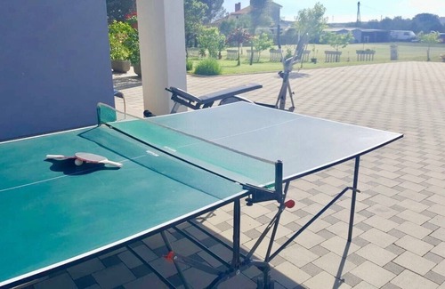 Skatari Apartment | Ground Floor Apartments With Spacious Backyard / Family apartment with spacious backyard and table tennis