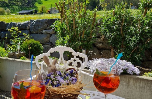 Schwanden House | Guest room "Vreneli" with terrace