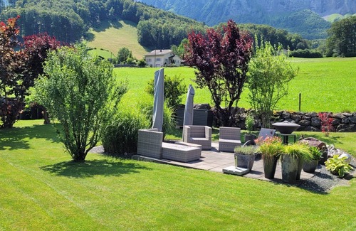 Schwanden House | Guest room "Vreneli" with terrace