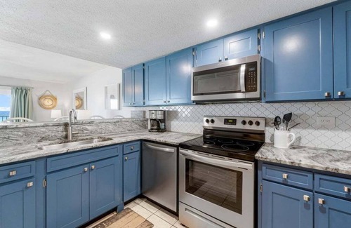 Biltmore Beach Condo | Gulf Front Paradise - Large Wraparound Balcony at Family Friendly Mariner West