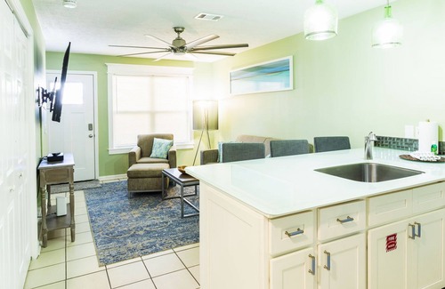 Panama City Beach Villa | Gulf View Condo with Pool & Grills. Minute walk to Beach. Pet-Friendly!