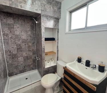 Cochrane Apartment | Habitación independiente con baño privado