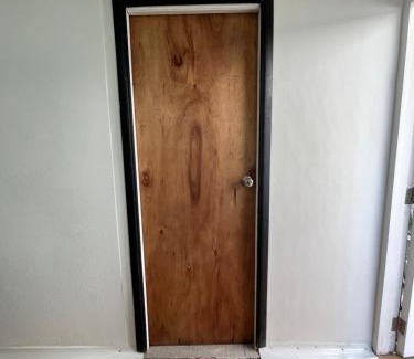 Cochrane Apartment | Habitación independiente con baño privado